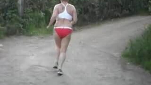 Granny jogs topless