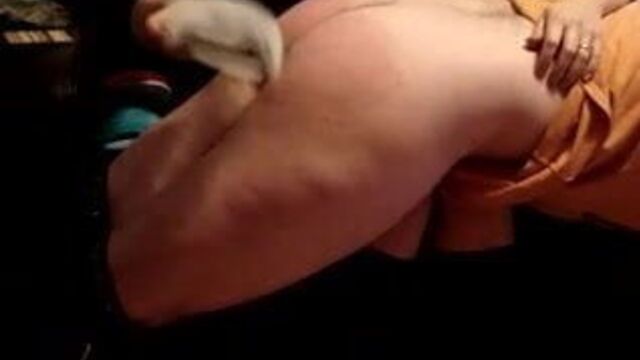 My wife giving me a slipper spanking