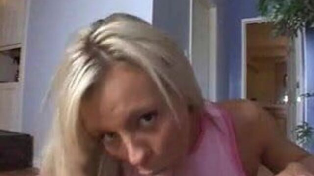 Nice blond uses a bib to blow