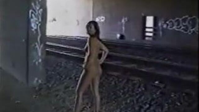 Hot woman nude walk around the railway