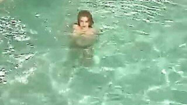 Hung tit babe swims in pool then shows off her tits and fuckholes