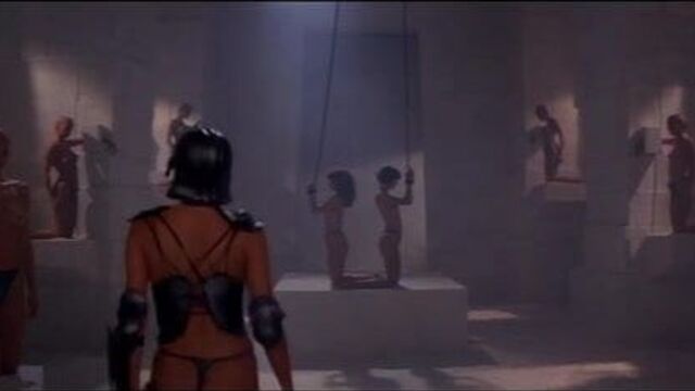 Tawny Kitaen & Zabou nude in Gwendoline clip 2