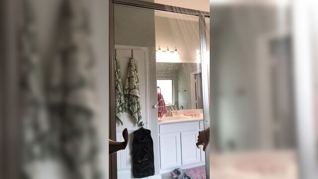 Curvy woman in a hot shower