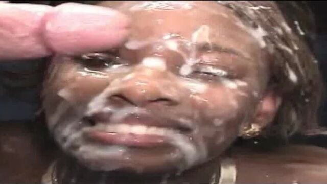 Pretty black girl covered in cum