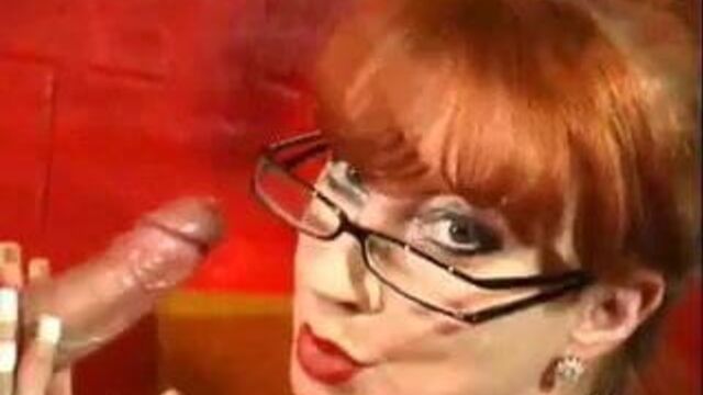 Redhead milf gives blowjob