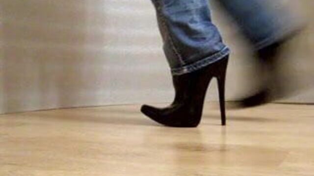 Walk in high heels boots
